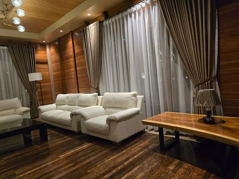 Living room in the Grand Villa with white sofas